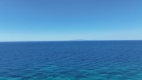 flying over the calm sea water