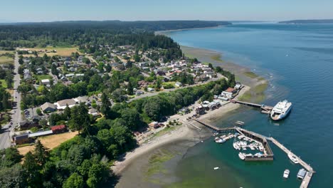 wide establishing aerial of the city of langley on whidbey island