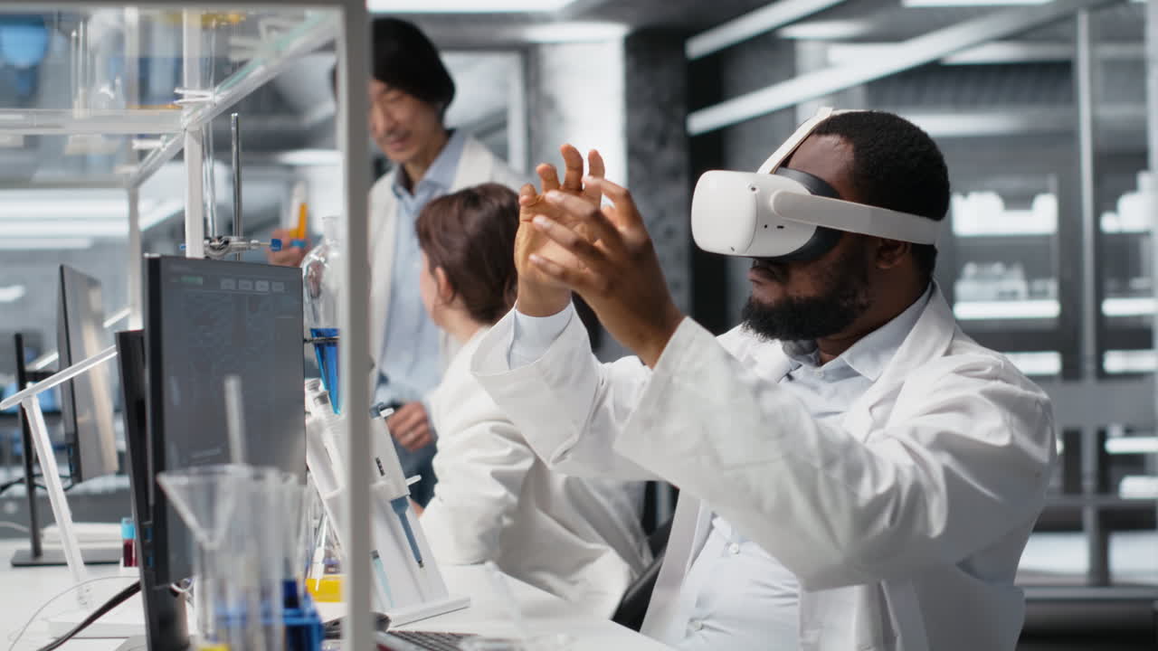 Vertical video Lab engineer at PC desk using VR goggles to look at molecular model, rotating it