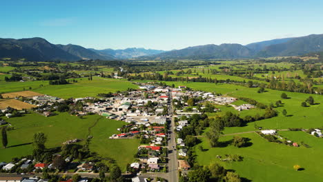 small town in takaka region of new zealand, aerial drone view