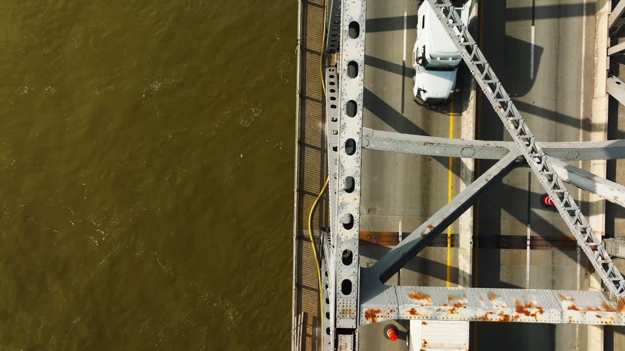 Aerial shot of West Memphis Delta Regional River Park, bridge over muddy waters
