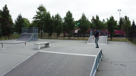 young adult hispanic skater failing to make skating tricks