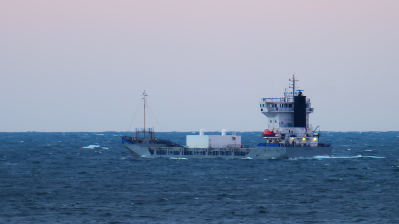 View of a boat moving on the sea in the evening