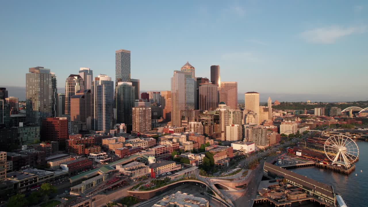 Gorgeous clear aerial of downtown Seattle waterfront with Pike's Place and Great Wheel, 4K
