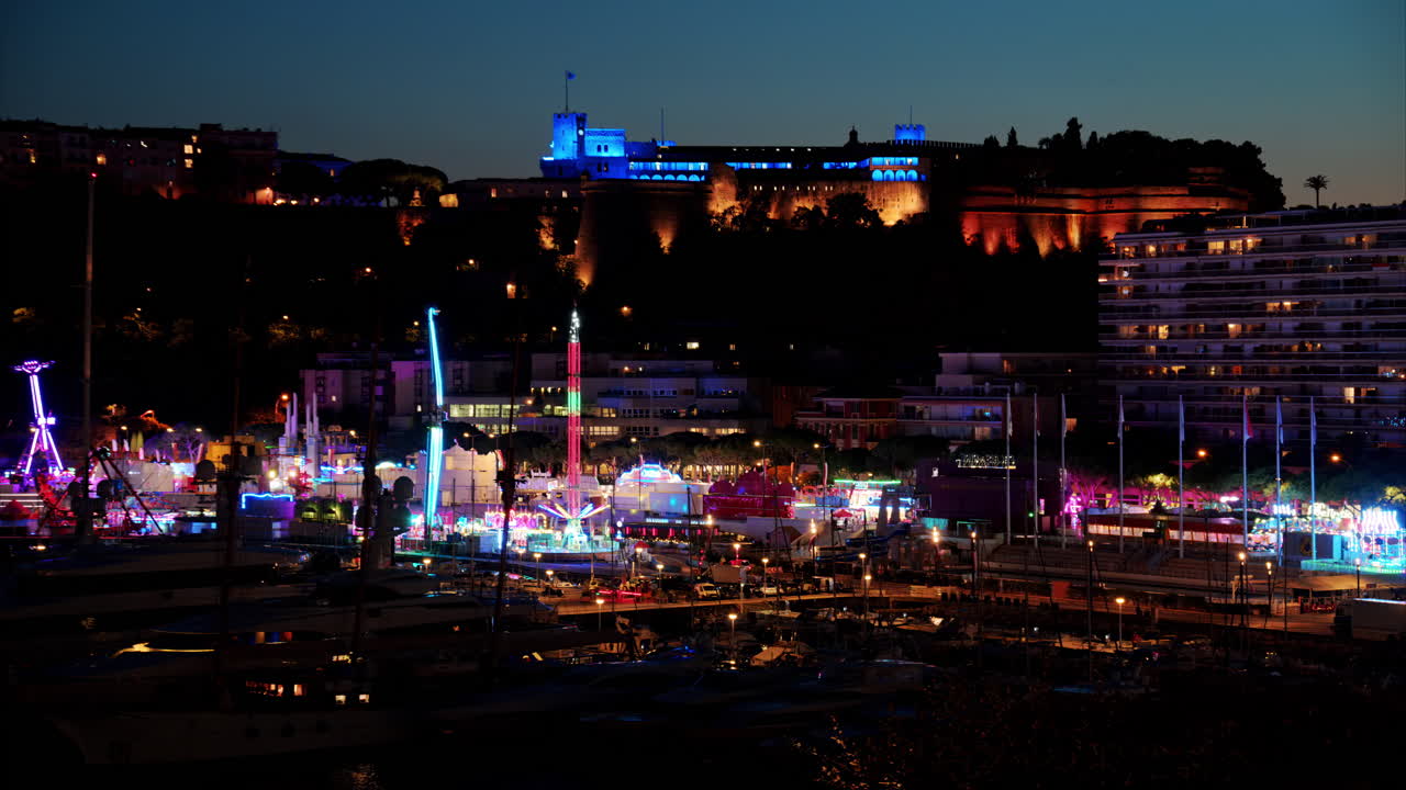 Aerial view of the Port Hercule Funfair in Monaco in the evening