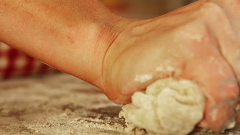 Close-up-of-hands-kneading-dough