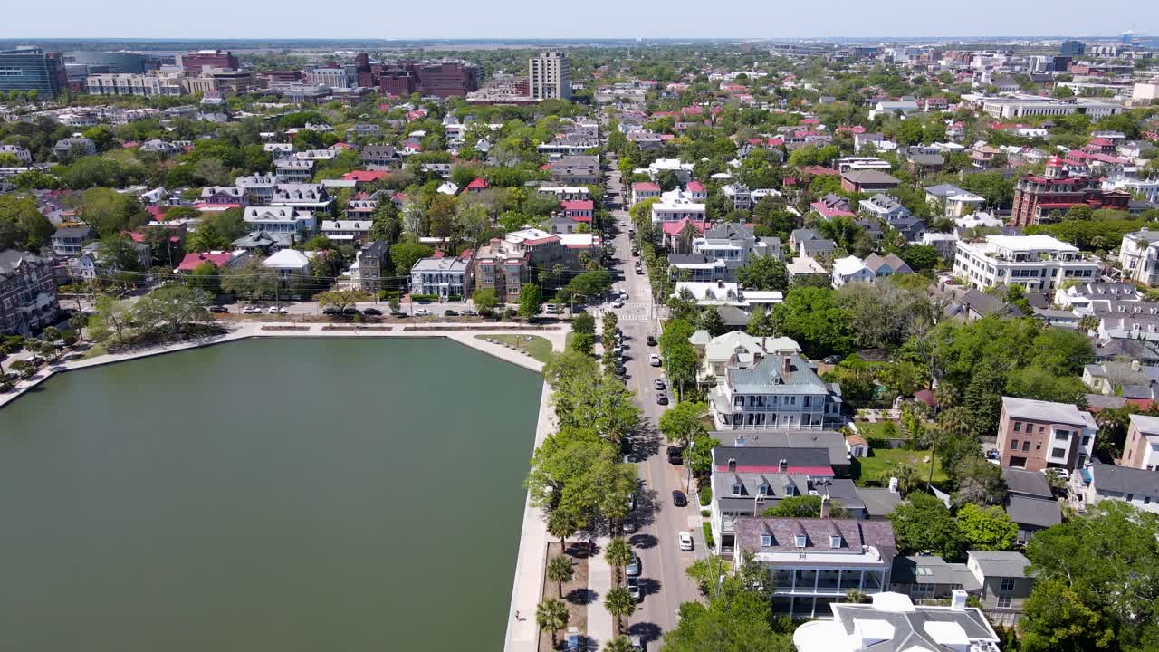 Charleston South Carolina aerial shot of Colonial Lake Park and street dolly forward shot wide