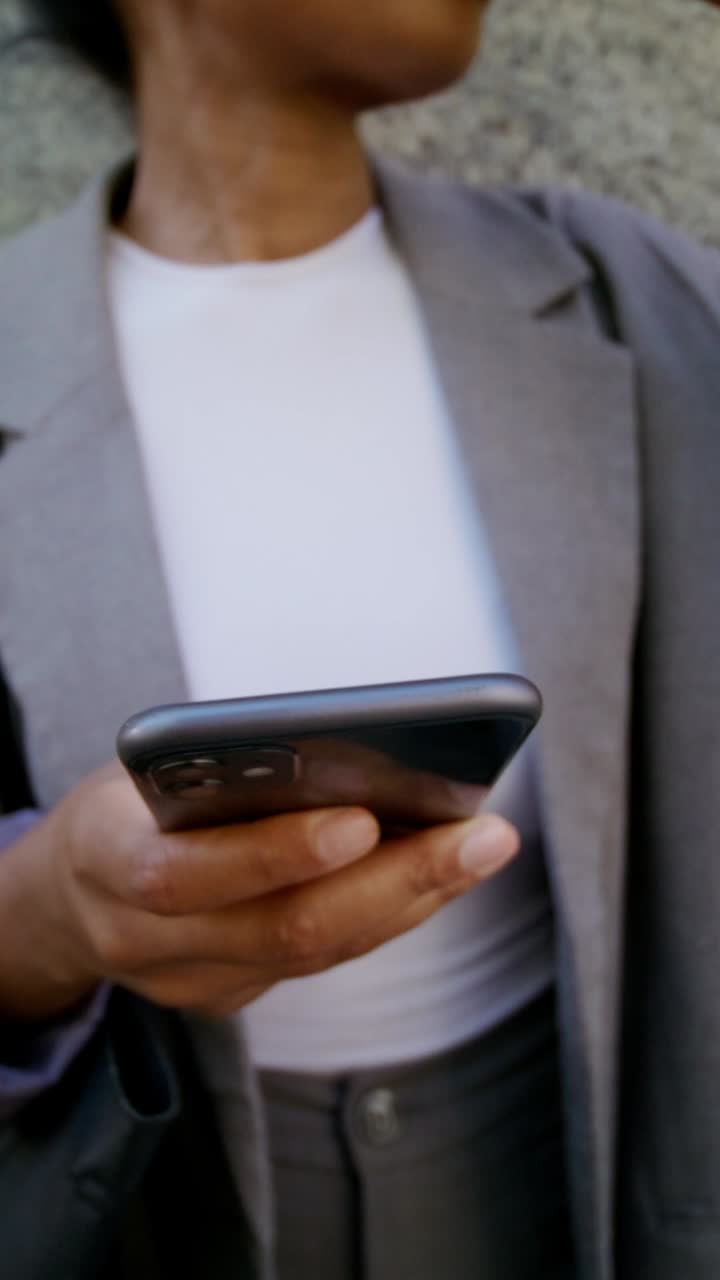 Woman using a smartphone outdoors