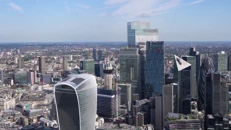 wide aerial view of the towers of the city of london, uk