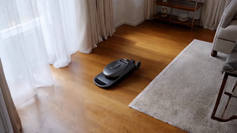 robotic floor cleaner on a wooden floor