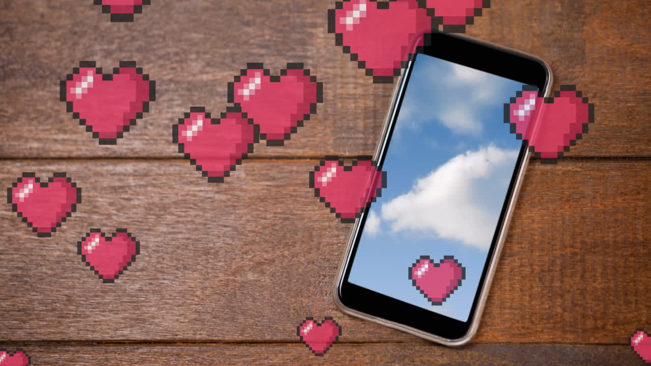 소셜 미디어  ⁇ 은 심장 아이콘과 나무 표면에 있는 스마트폰의 애니메이션