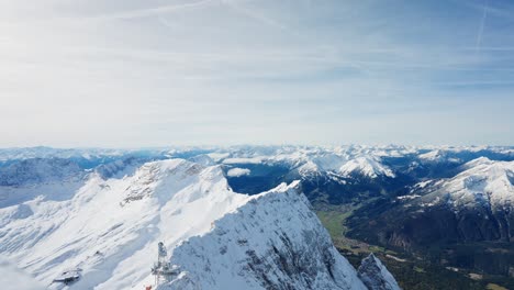 view over the railing on a snowy mountain in the european alps