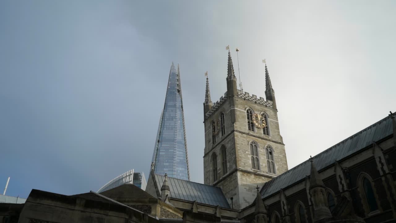 London Cityscape: Modern Skyscrapers and Historic Cathedral