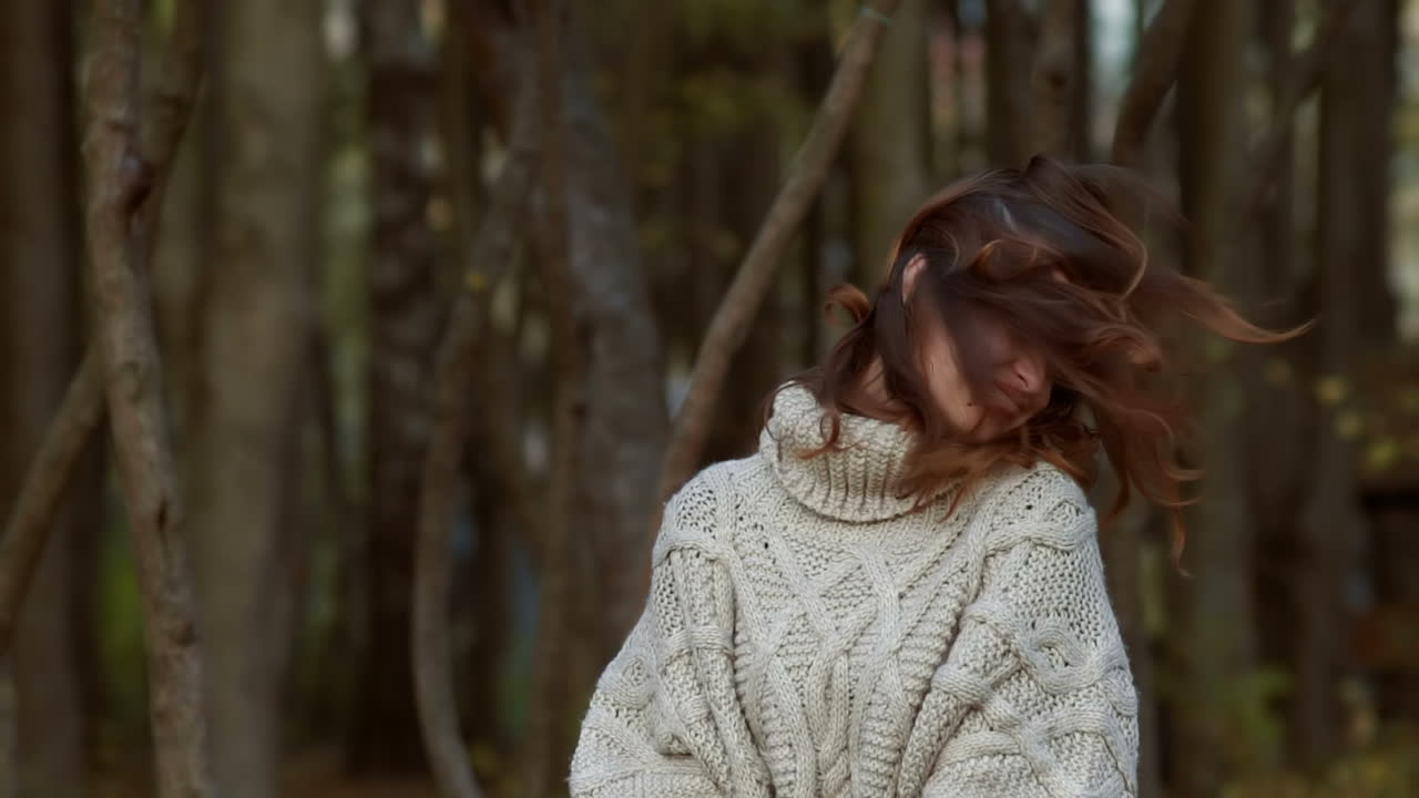 Autumn woman in autumn park. Autumn woman in autumn park. Warm sunny weather. Fall concept