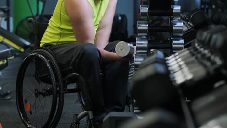 man with disabilities training in the gym of rehabilitation center