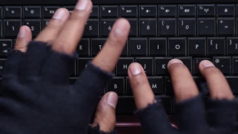 hands typing on a keyboard