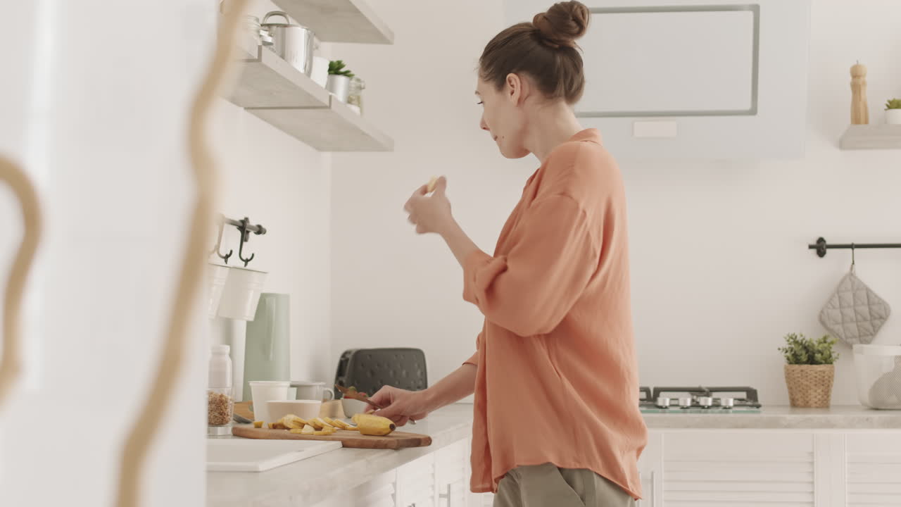Beautiful Woman Making Breakfast