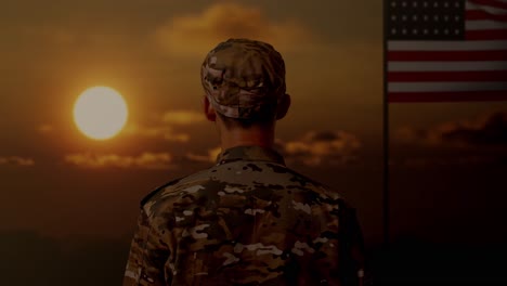 close up of back view of asian man soldier looking around while standing with flag of the united states, sunset time