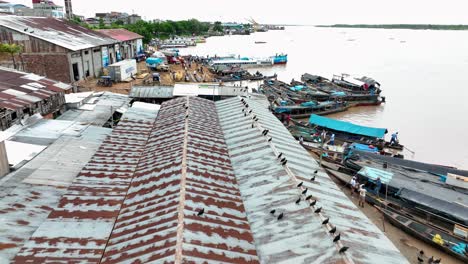 Pucallpa,-Perù---City-on-the-Amazon-River-jungle-rainforest---4k-HIgh-Resolution---Drone-fly-view-shot-from-above