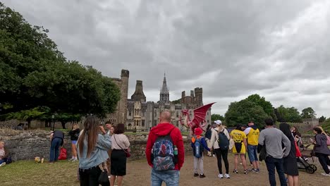 people gather outside cardiff castle in wales