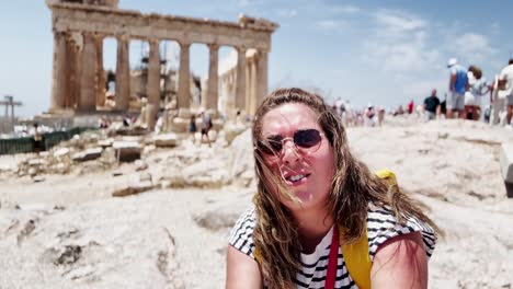 close-up of a female tourist on a sunny day, athens, greece