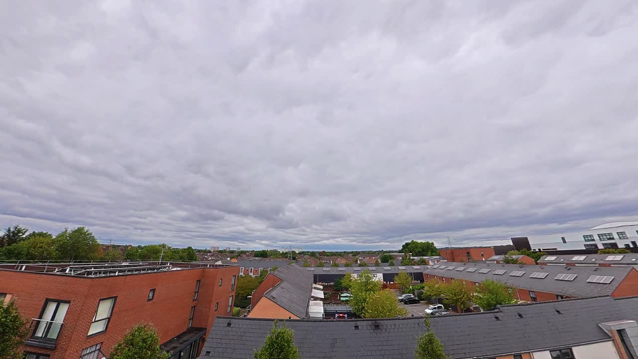 Cloudy day Enfield timelapse above urban neighborhood, tranquil yet dynamic