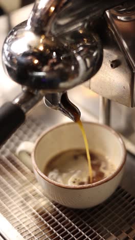 espresso machine pouring coffee