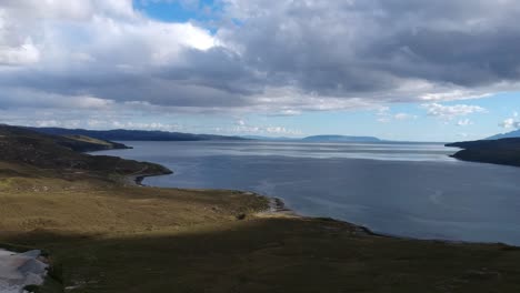 timelapse drone shot of scottish highland lake