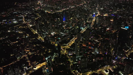 Panama-City-Aerial-v93-high-angle-birds-eye-view-flyover-campo-alegre,-el-cangrejo-capturing-downtown-night-cityscape-of-upscale-and-lively-entertainment-district---Shot-with-Mavic-3-Cine---April-2022