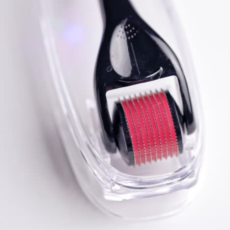 dermaroller for medical micro needling therapy. tool also known as: derma roller, mesoroller, meso-roller, mesopen.