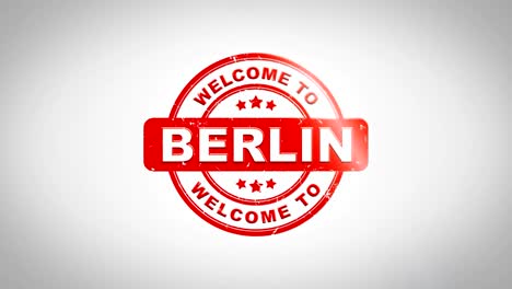 welcome to berlin signed stamping text wooden stamp animation. red ink on clean white paper surface background with green matte background included.