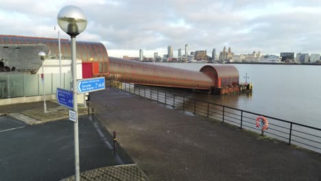 woodside ferry village terminal aerial descending view across birkenhead liverpool harbour skyline