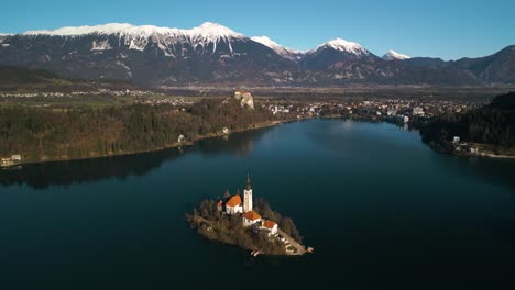 beautiful orbiting shot high above lake bled, slovenia