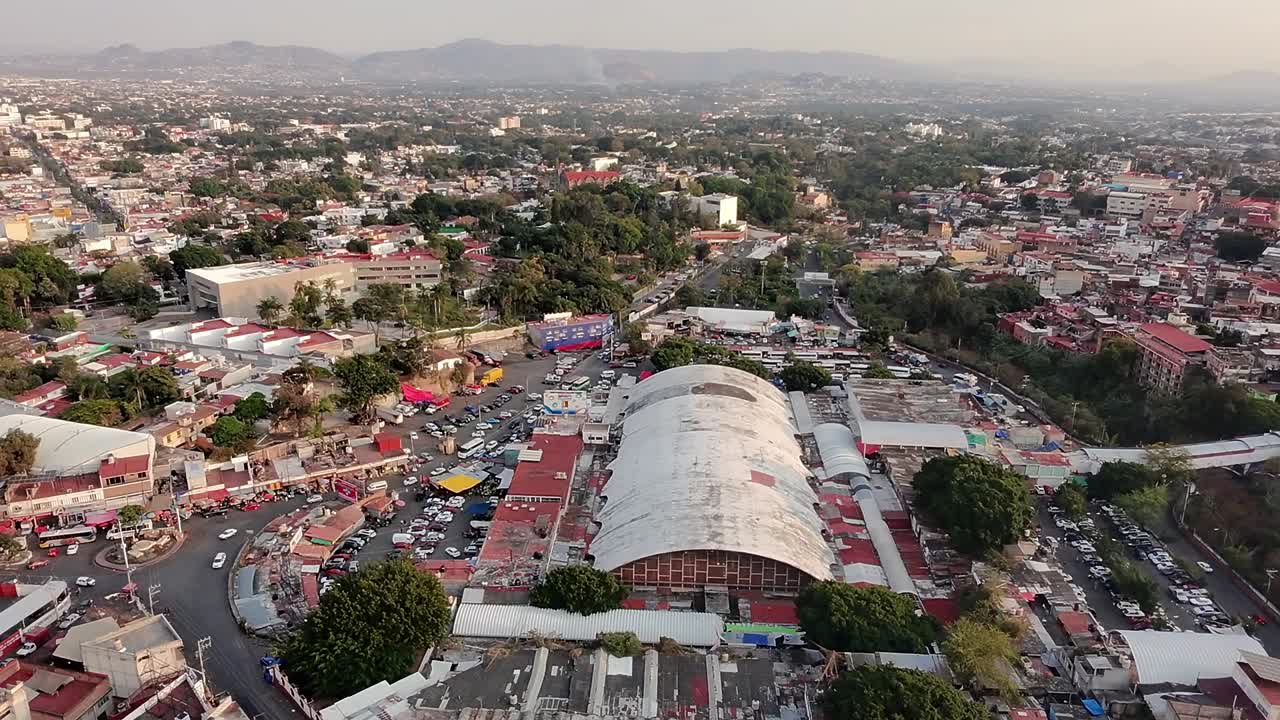 Aerial drone shot of market Adolfo Lopez Mateos and cityscape during the day in Cuernavaca, Morelos, Mexico