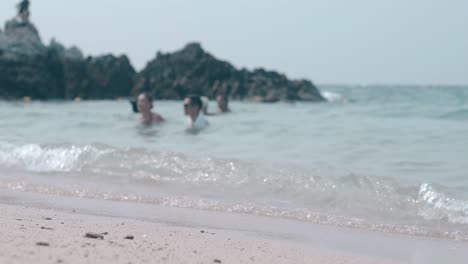 yellow-sandy-beach-washed-by-ocean-foaming-waves-in-tropics