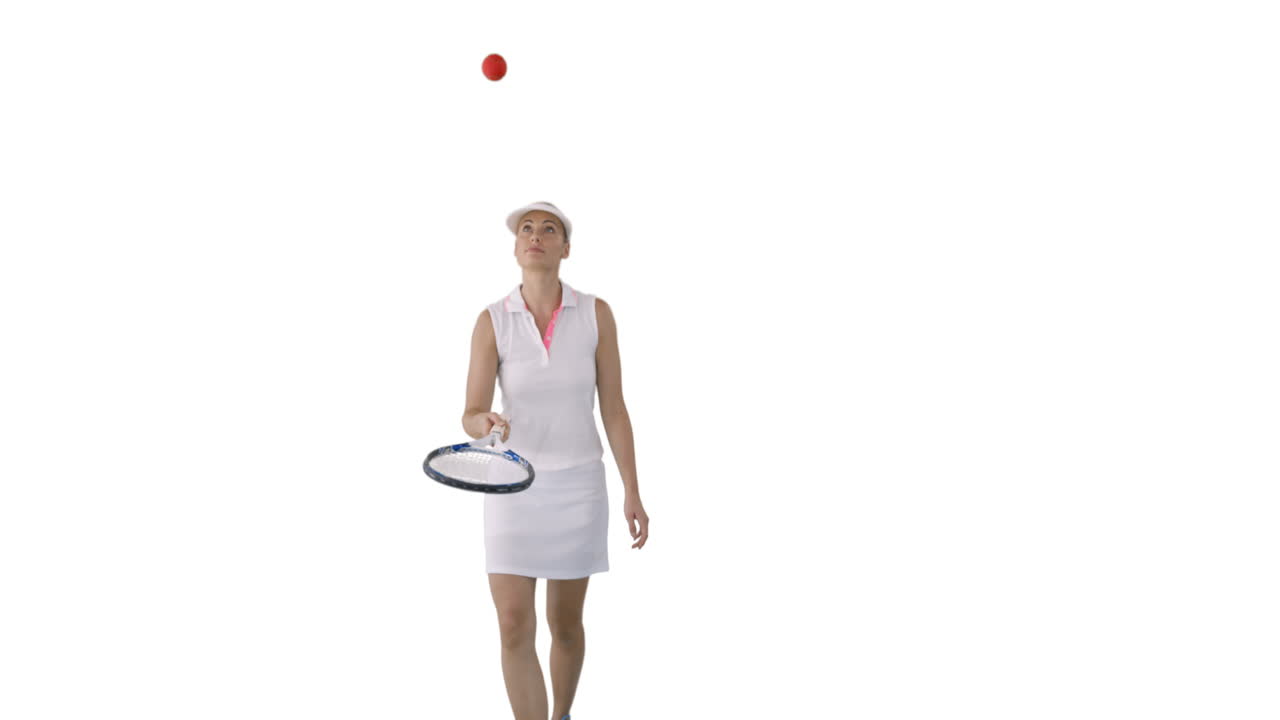 스포츠 여성이 테니스를 하고 있습니다.