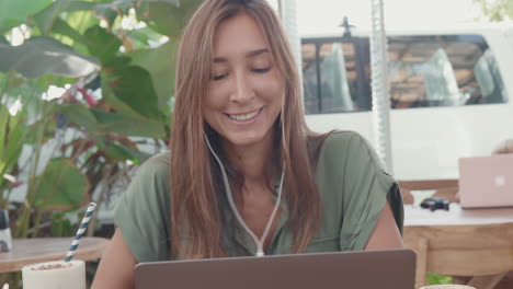 caucasian female freelancer video calling outdoors