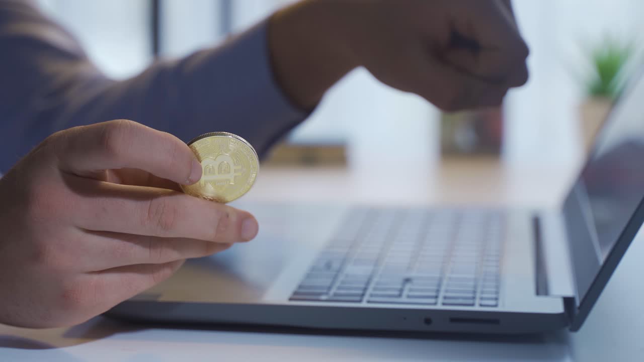 Financial investment. Bitcoin in businessman's hand.