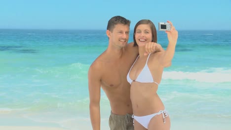 sweet couple taking pictures and having fun
