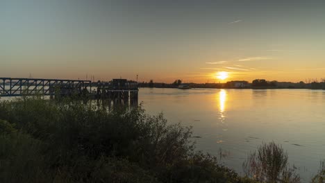 boat docking station near port of antwerpen on river schelde, day to night timelapse shot