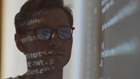 Close Up of Programmer in Eyeglasses