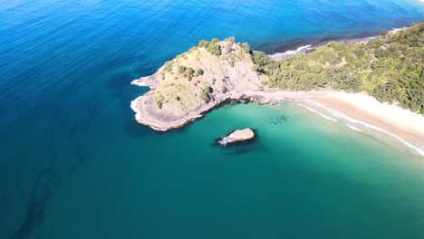 aerial view of new chums beach in the coromandel peninsula of new zealand's north island