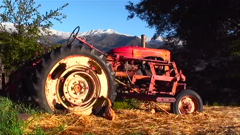 A-tractor-sits-in-a-wooded-area