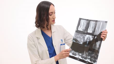 female doctor examining medical scans