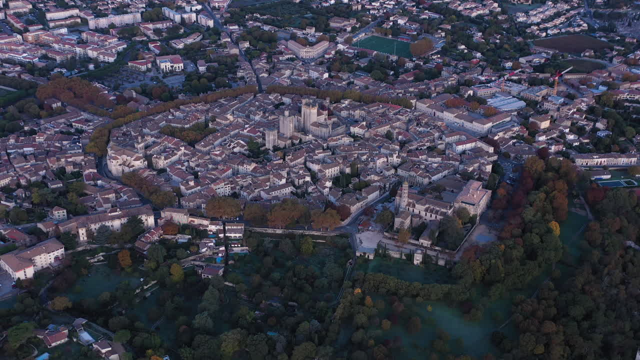 South of France village Uzès from above global aerial view trees surrounding