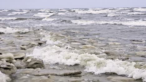 a beach covered in ice and snow