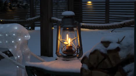 outdoor lamp in the snow at night