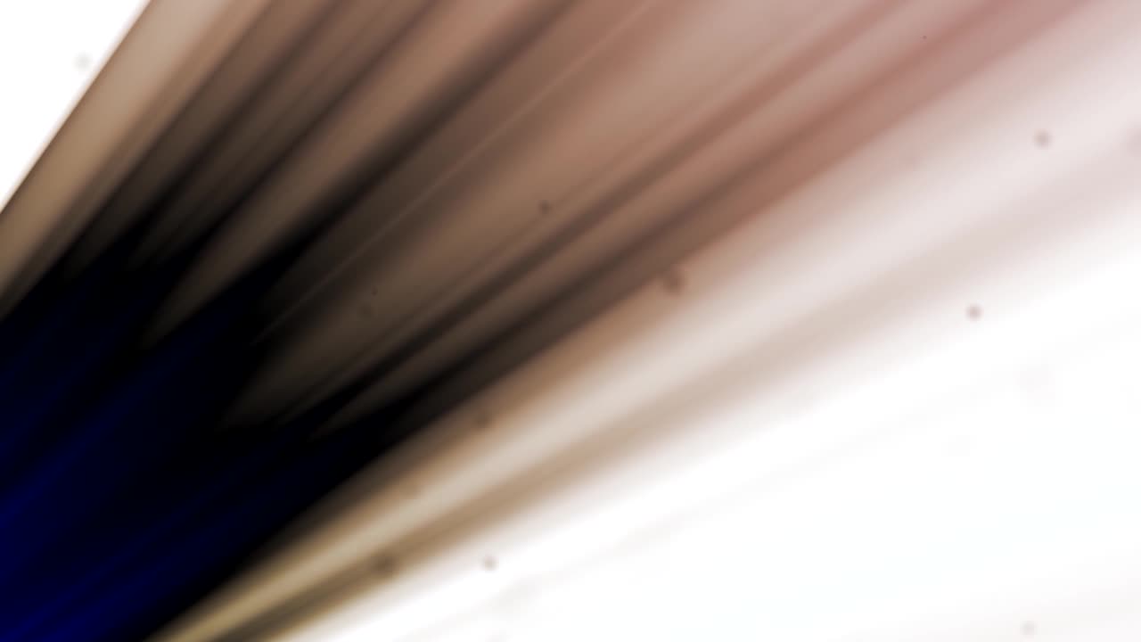 검정색과 주황색 반짝이는 광선 효과 애니메이션 오버레이