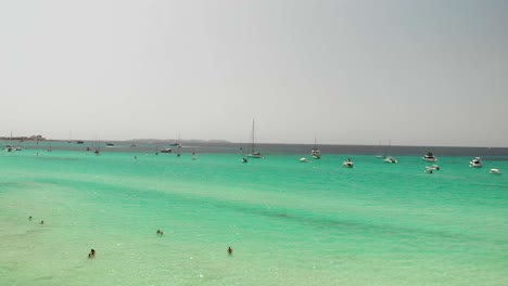 Spain,-Mallorca-Platja-des-Trenc-beach-a-beautiful-fly-by-over-the-beach-at-4k-24-fps-with-ND-filters-on-a-very-bright-day-with-a-DJI-Mavic-Air-drone