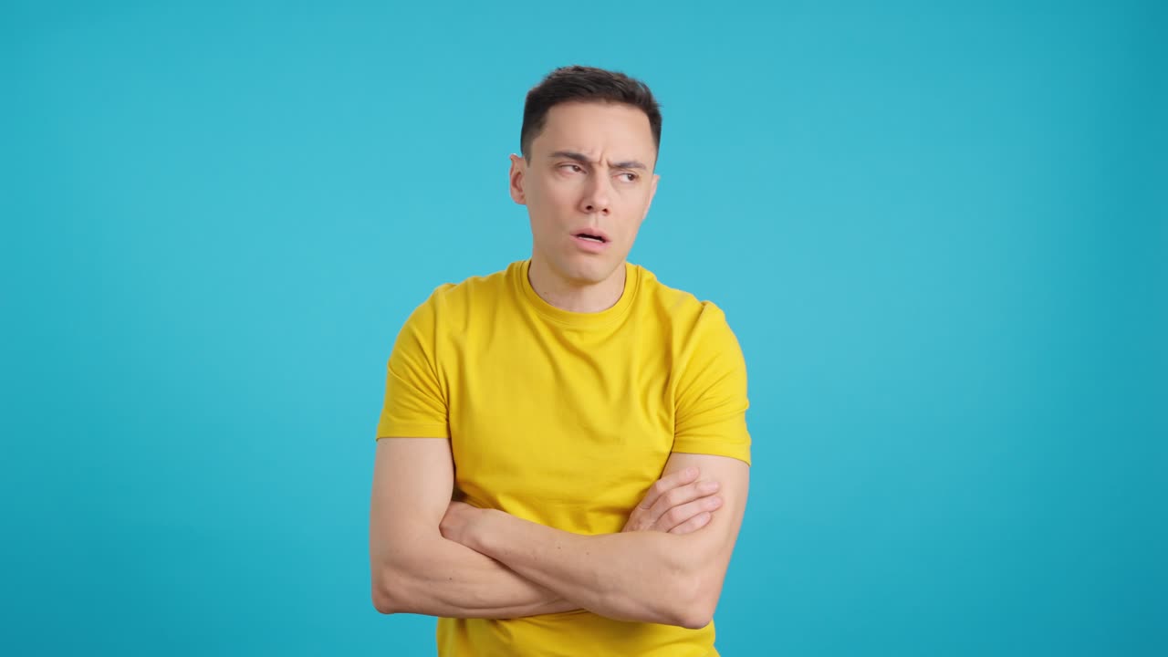 Man in yellow t-shirt with different expressions